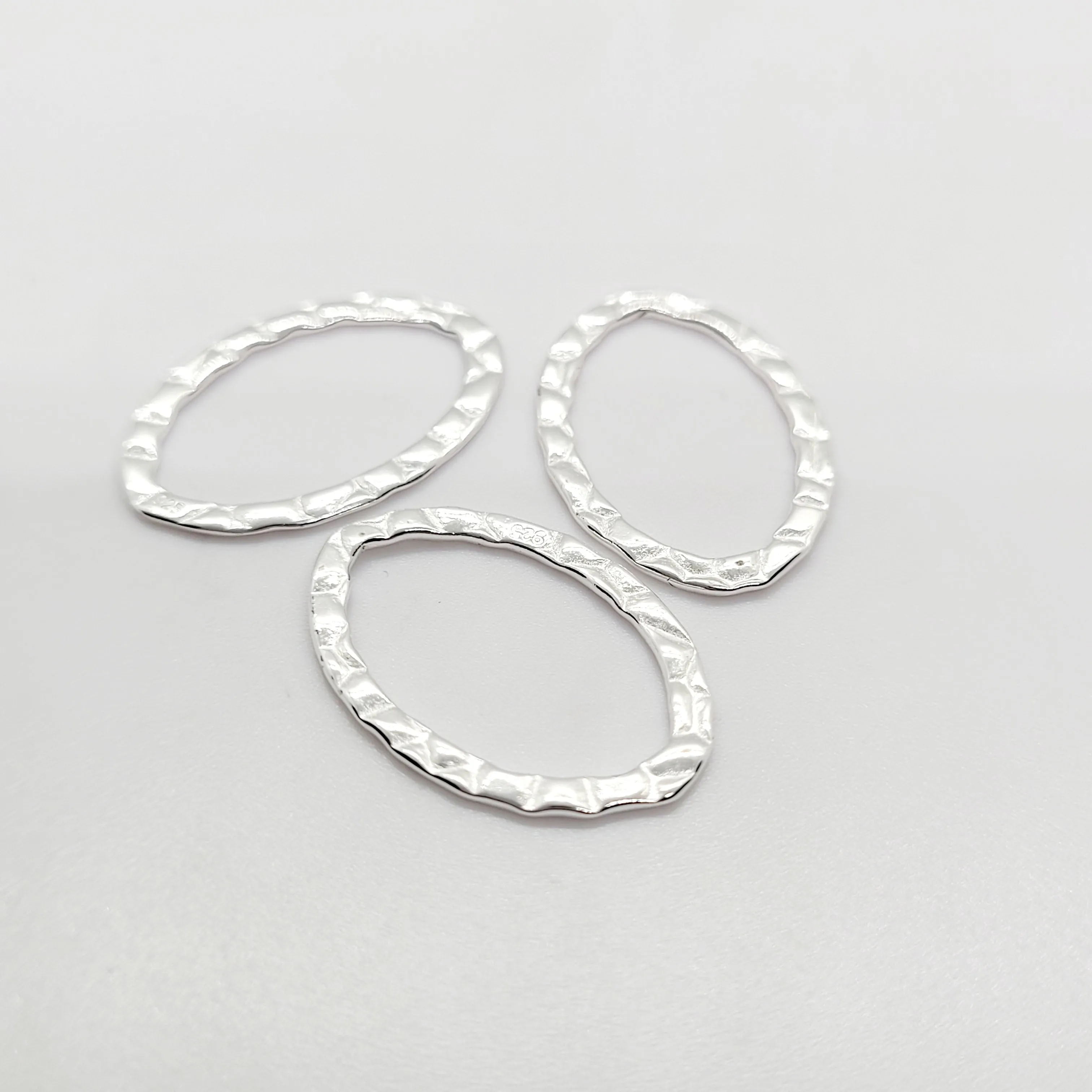 .925 Sterling Silver Textured Connector Pendant Earring Feature