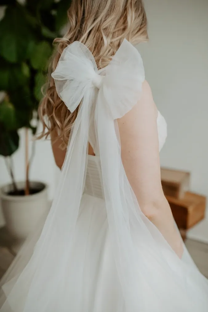 Oversized Bow Wings